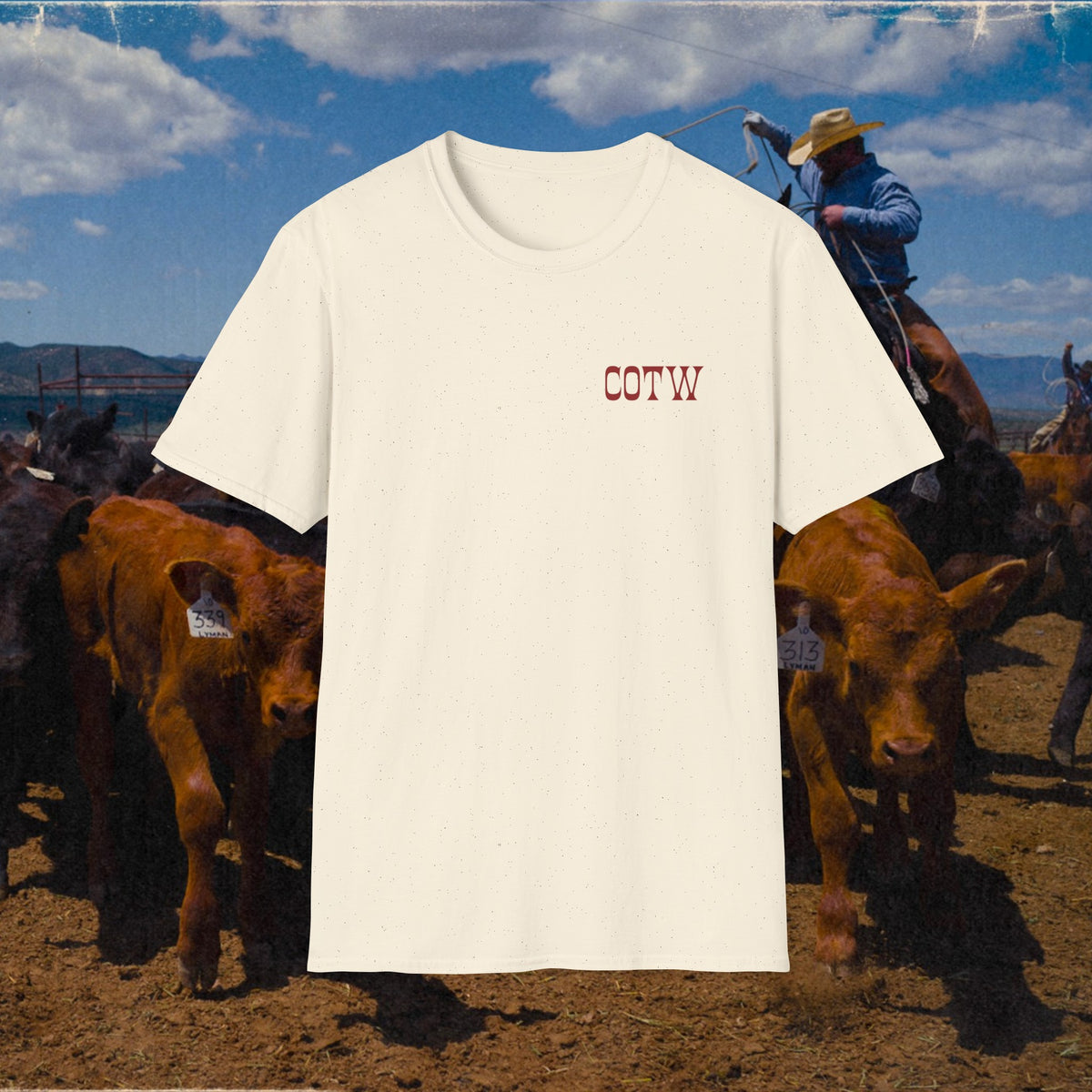 Natural Keep Your Powder Dry shirt showing its small COTW chest print