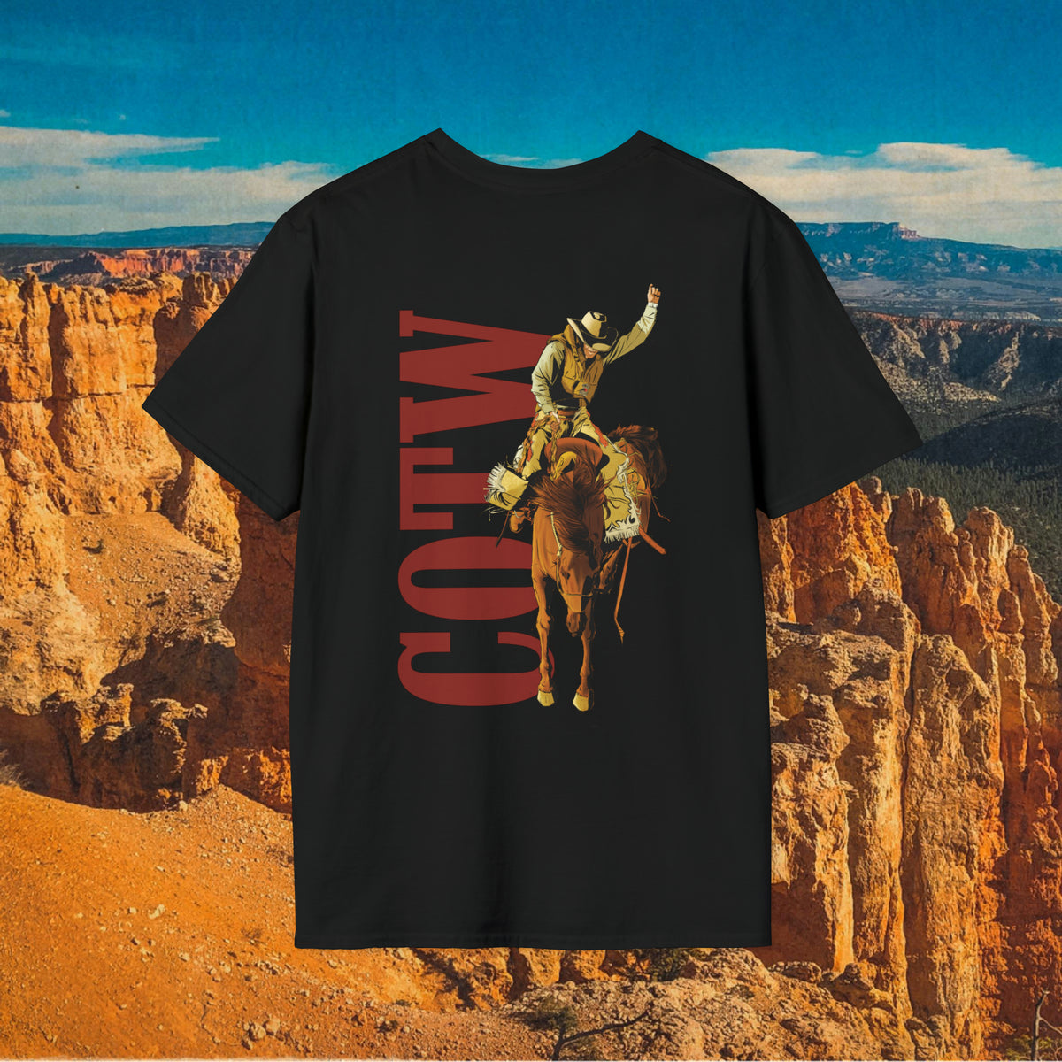 Black Let Him Buck T-shirt with bucking horse and rider artwork beside red COTW lettering