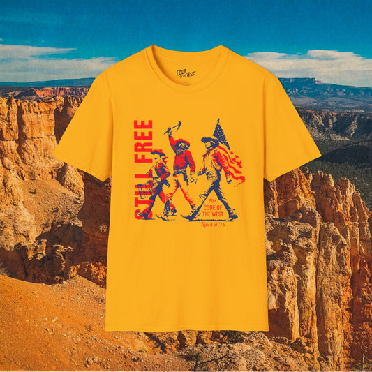 Gold Spirit of ’76 T-shirt with cowboy trio and Still Free lettering