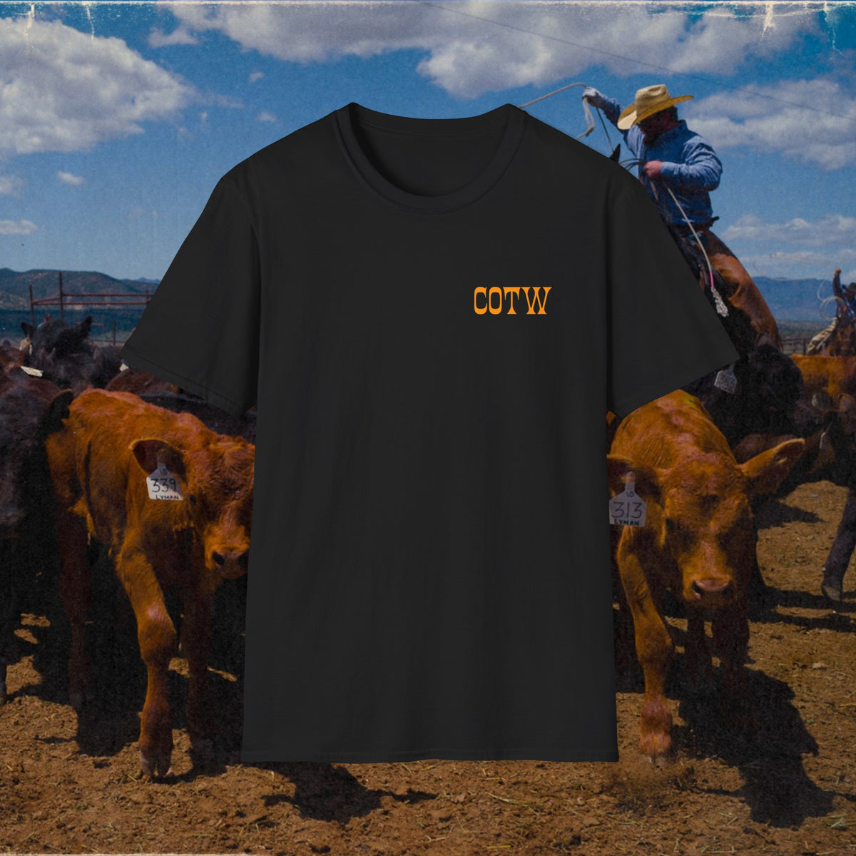 Black Keep Your Powder Dry shirt showing its small gold COTW chest print