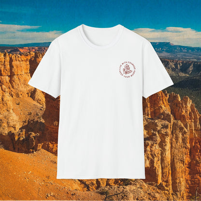 White Let Him Buck shirt showing its small circular chest mark