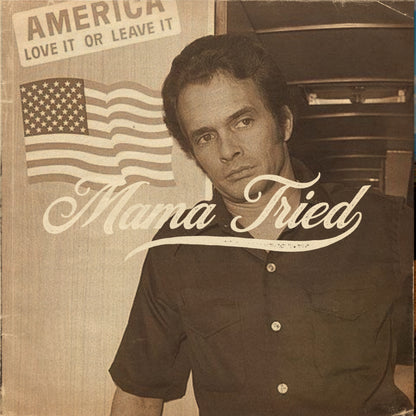 Sepia photograph of a seated man with Mama Tried lettering