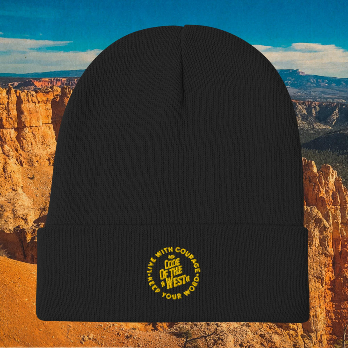 Black B1 knit beanie with an embroidered yellow Code of the West circular logo