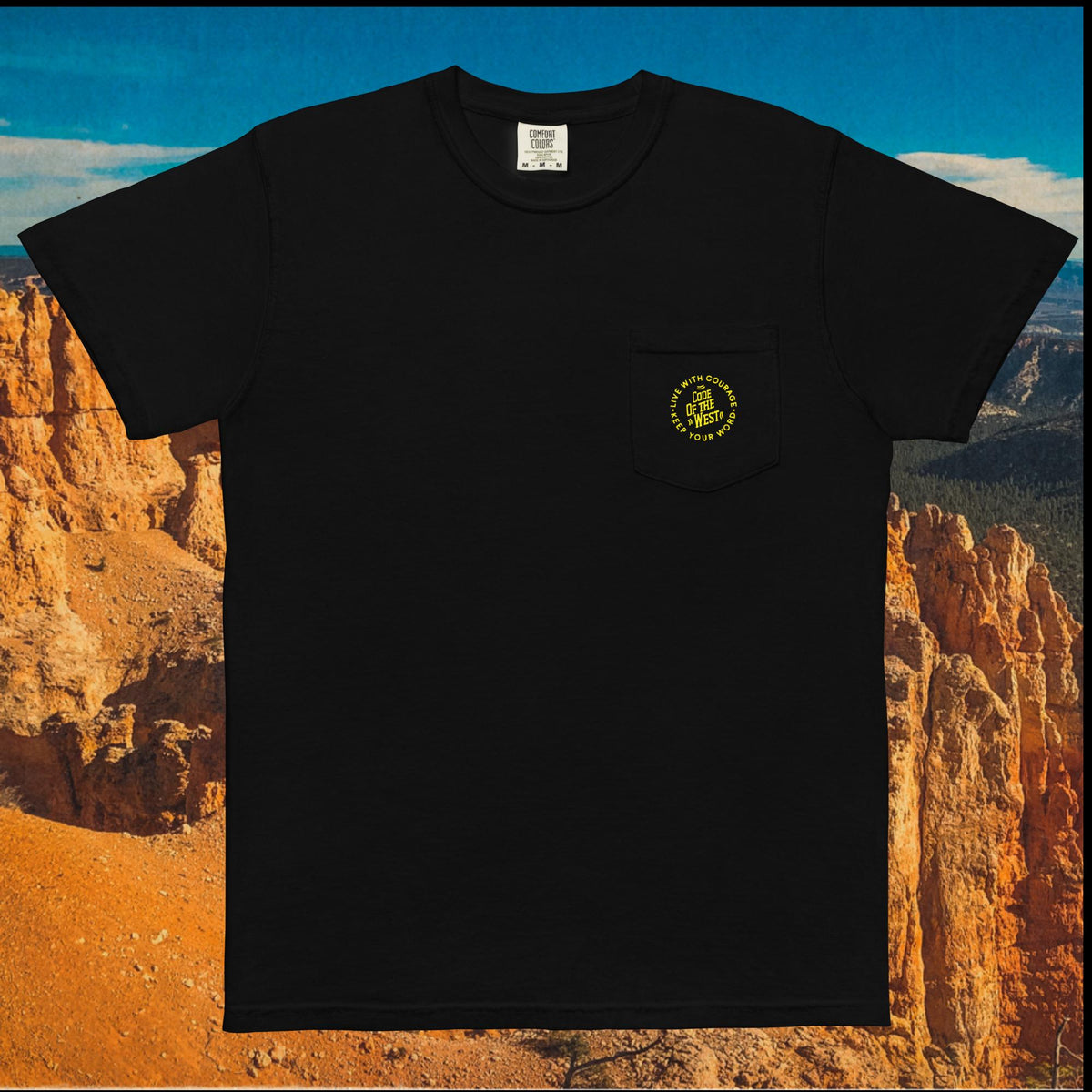 Black Dad’s Pocket Tee with a small gold COTW mark on the chest pocket