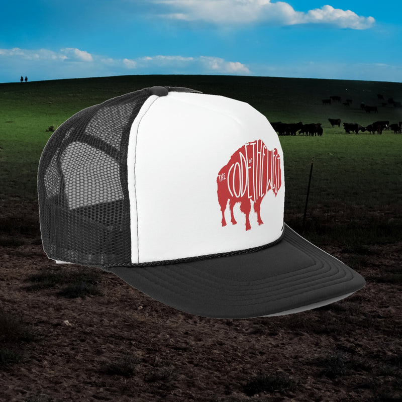 Buffalo Cafe trucker hat, angled view, showing the red buffalo logo and black mesh back