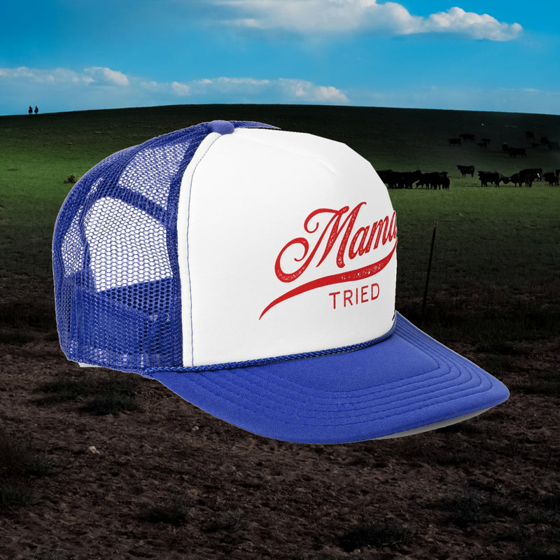 Mama Tried trucker hat in royal blue with white front and red script, angled view