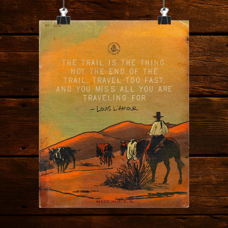 The Trail Is the Thing print with riders crossing an orange desert landscape beneath a green sky