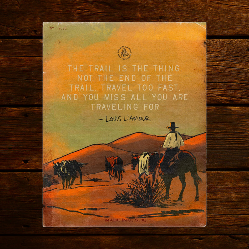 The Trail Is the Thing print with riders crossing an orange desert landscape beneath a green sky