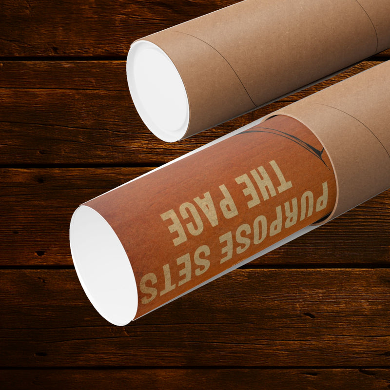 Purpose Sets the Pace cowboy art print rolled beside a cardboard mailing tube